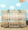 Florence Modular Crib with Lockable Wheels in Natural Finish