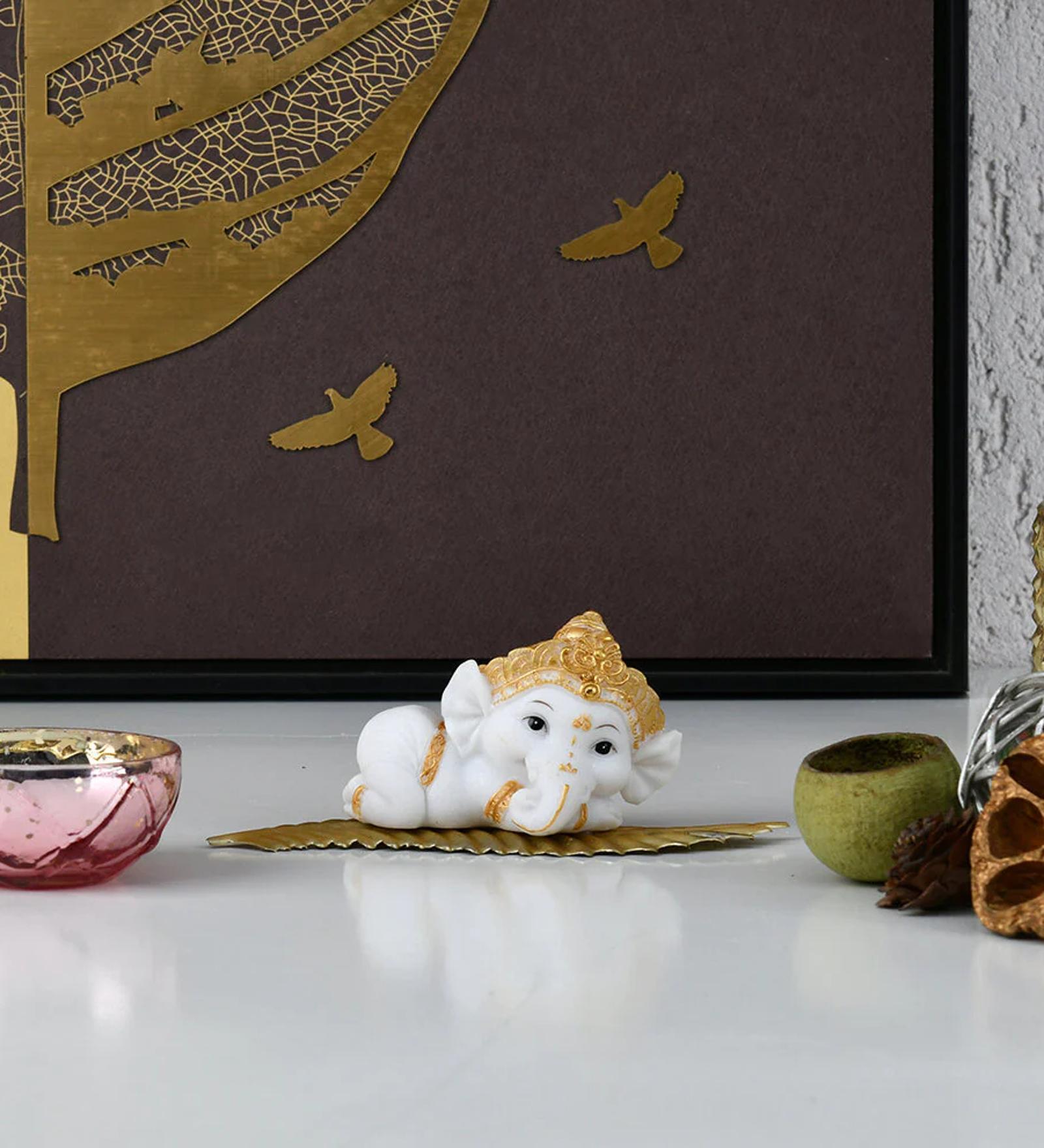 Ganesha On Leaf White & Gold Polyresin Religious Idols