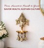 Golden Ganesha Brass Wall Decor with Hanging Diyas and Bells