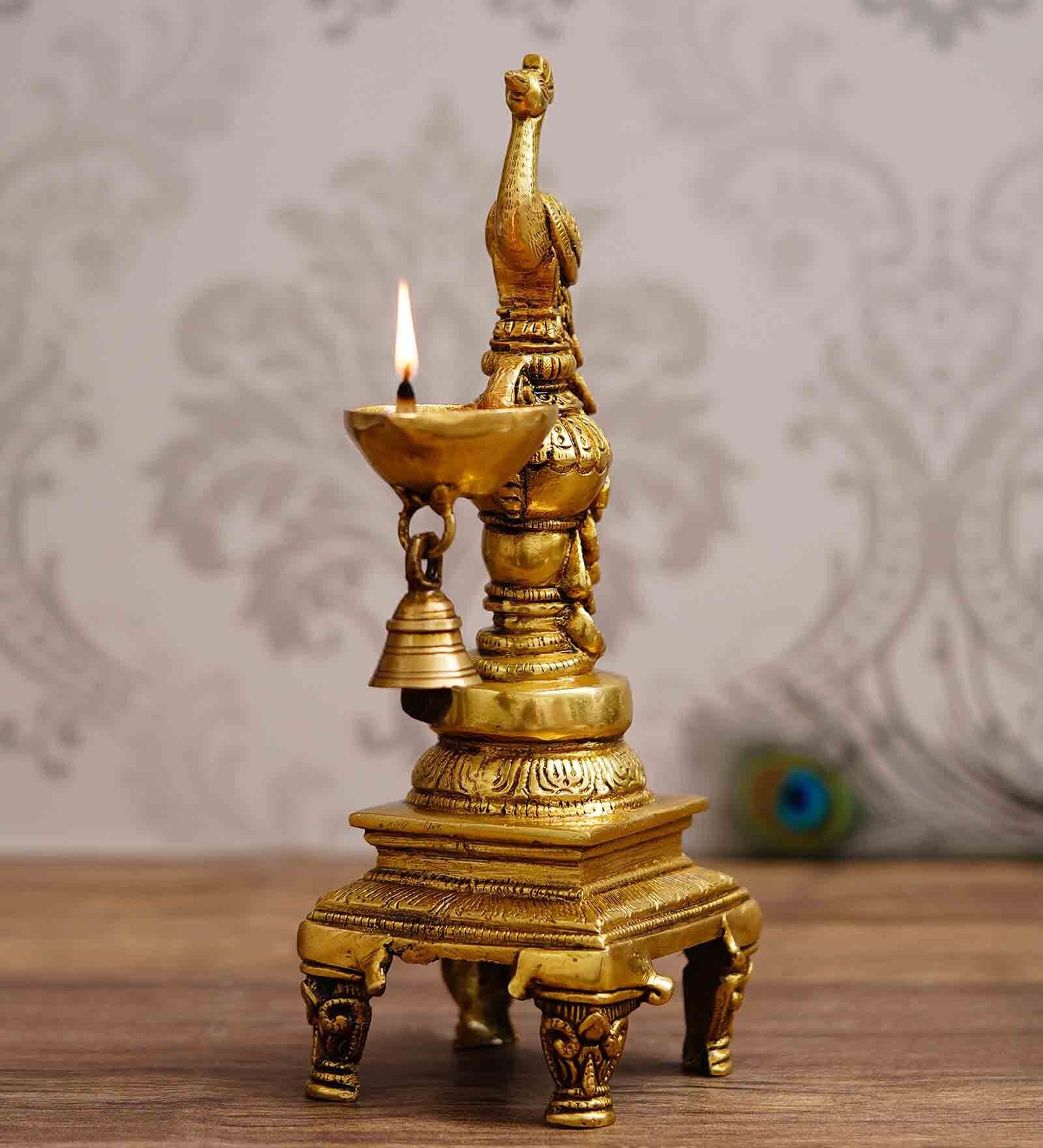 Gold Brass Antique Finish Handcrafted Peacock Diya With Bell And Stand