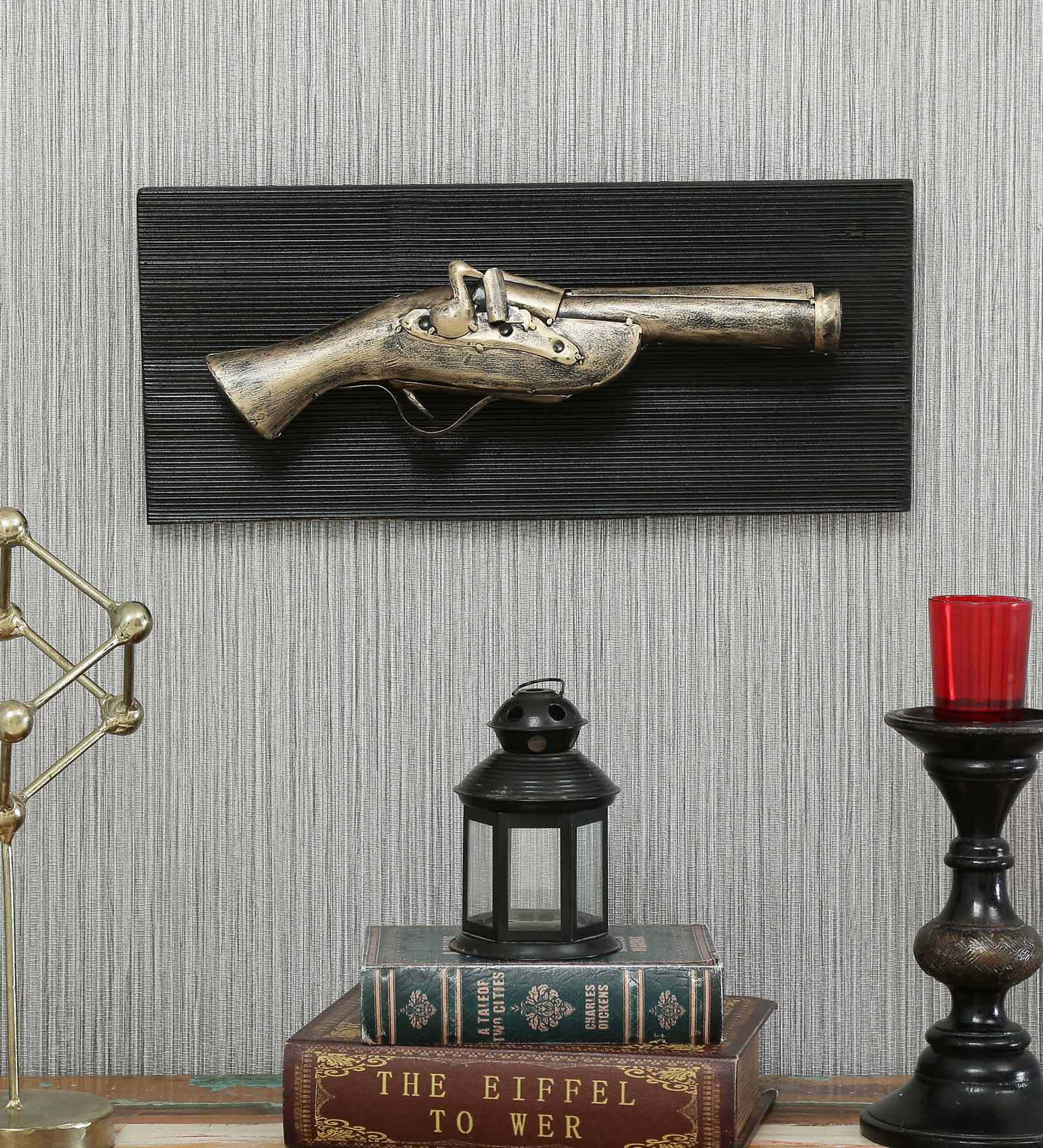 Buy Wrought Iron Short Gun In Golden Wall Art By Malik Design at 25