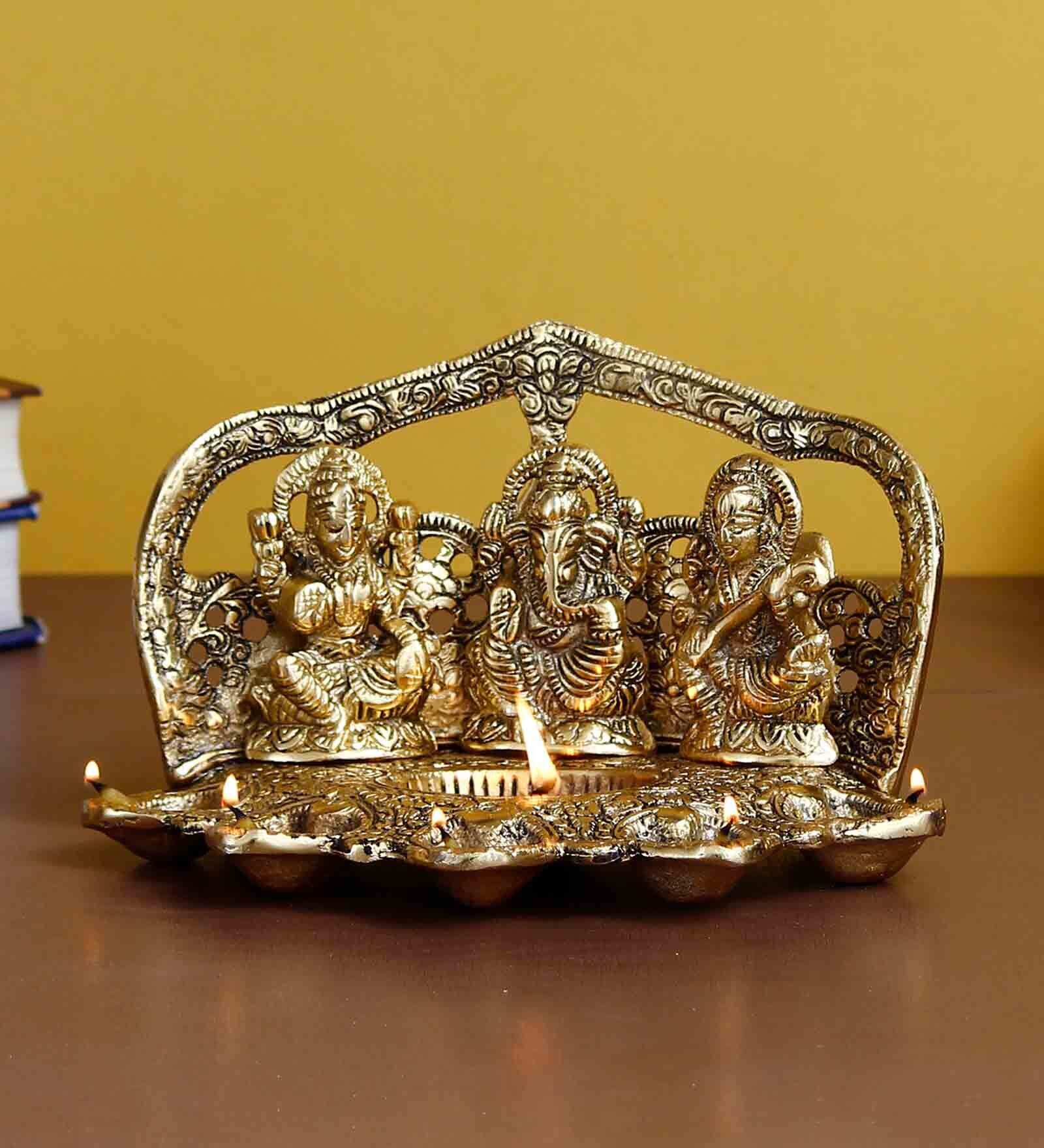 Gold Metal Laxmi Ganesha Saraswati with Diya for 6 Wicks Handcrafted eCraftIndia