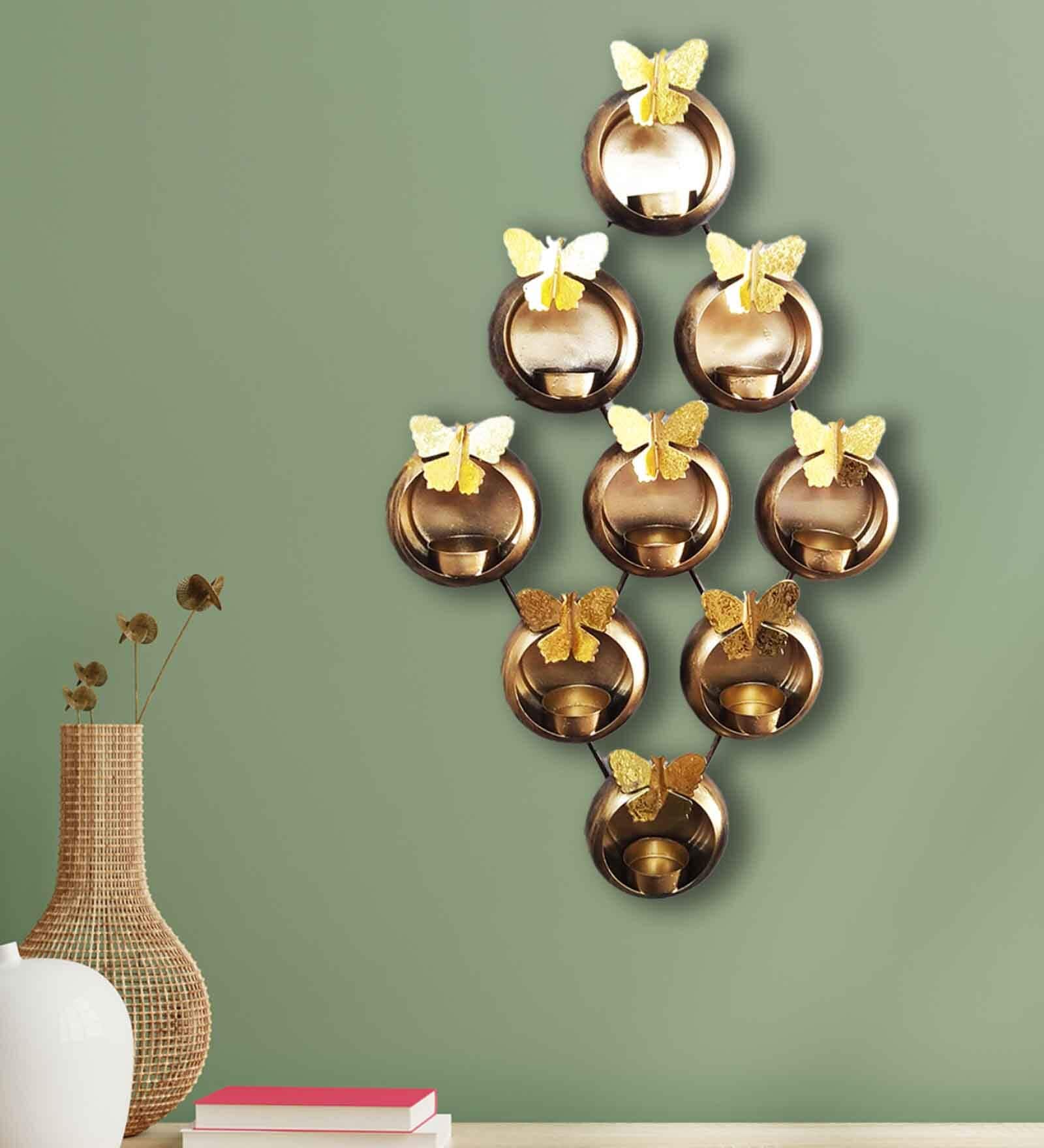 Buy Gold Metal Wall Hanging Candle Holder by Wens at 55 OFF by Wens