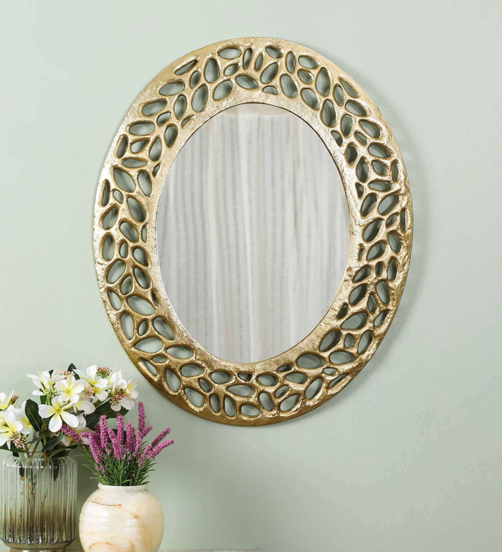 Buy Metal Oval Wall Mirror in Gold colour by Cocovey Online Oval