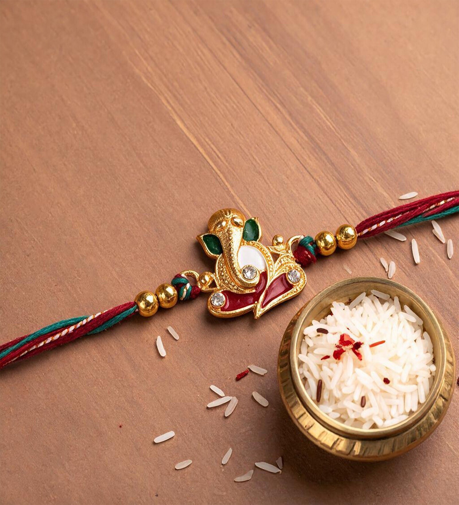 Gold Premium Ganesha Handmade Rakhi With Anchor Non-Bleeding Cotton Thread