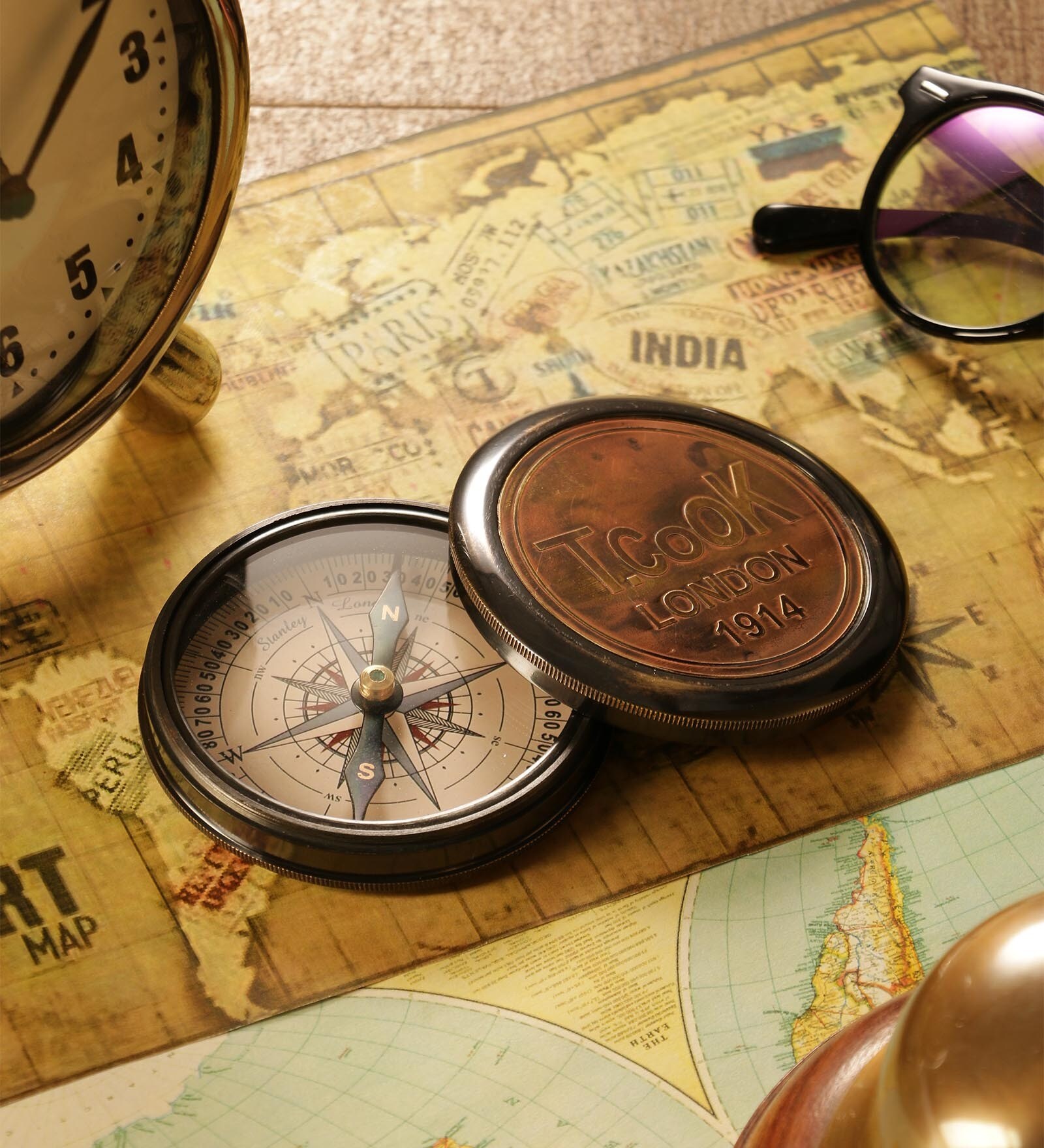 Buy Gold T Cook London Compass at 31% OFF by Exim Decor | Pepperfry