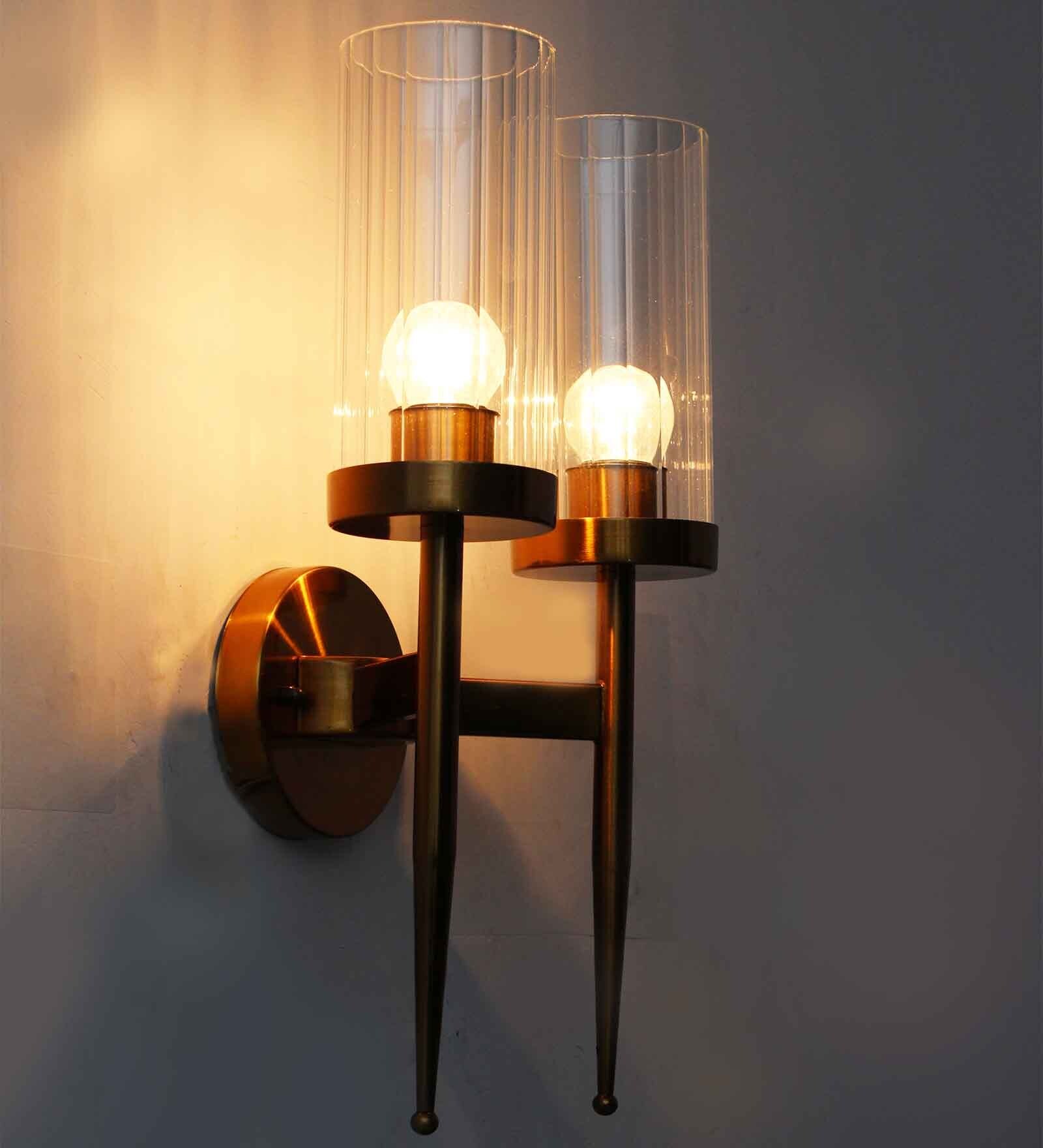 Golden Finish Wall Light With Cylindrical Dual Arm | Clear Glass