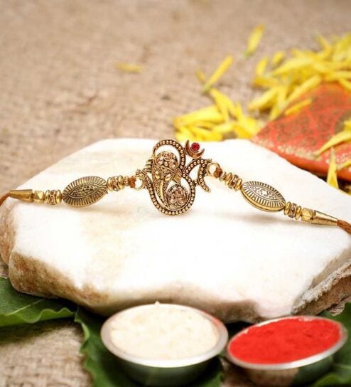 Golden Beads, Om Symbol Religious Designer Rakhi with Roli Chawal Pack
