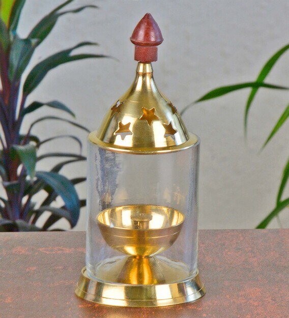 brass diya with glass cover