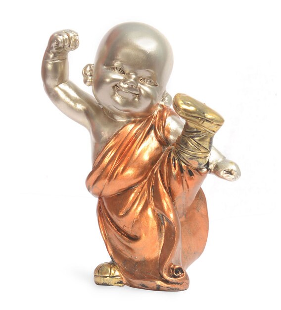 Buy Gold Polyresin Baby Monk Kicking Showpiece By home Online Feng