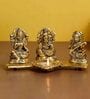 Gold Metal Laxmi Ganesha Saraswati with Diya on Leaf Chowki Handcrafted eCraftIndia