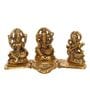 Gold Metal Laxmi Ganesha Saraswati with Diya on Leaf Chowki Handcrafted eCraftIndia