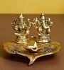 Gold Metal Laxmi Ganesha With Diya On Leaf