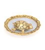 Gold Metal Tortiose On Glass Plate