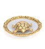 Gold Metal Tortiose On Glass Plate