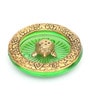 Gold Metal Tortoise Incense Holder Placed In Green Glass