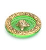 Gold Metal Tortoise Incense Holder Placed In Green Glass