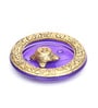 Gold Metal Tortoise Incense Holder Placed In Purple Glass Vessel