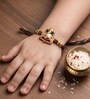 Gold Premium Ganesha Handmade Rakhi With Anchor Non-Bleeding Cotton Thread