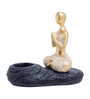Gold-Toned & Black Meditating Figurine Showpiece Cum Candle Holder