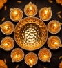 Golden Brass Urli Bowl with Diya Set Golden Brass Urli Bowl with Diya Set