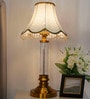 Golden Table Lamp with Fluted Glass Pillar and Scalloped Zigzag Shade