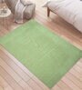 Green Solidd Jute & Cotton 5 ft x 7 ft Hand Woven Carpet
