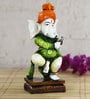 Green Lord Ganesha Playing Instrument Decorative Showpiece
