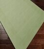 Green Solid Wool 5 ft x 7 ft Hand Woven Carpet