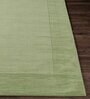 Green Solid Wool 5 ft x 7 ft Hand Woven Carpet