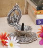 Grey Aluminium Ganesh Diya In Metal With Swastik Idol