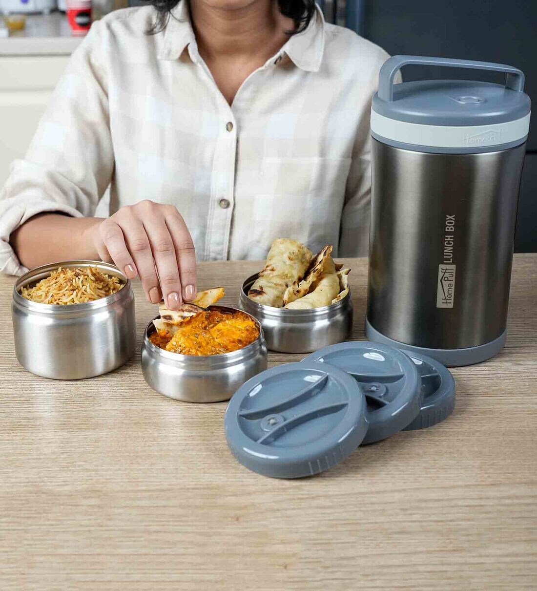 https://ii1.pepperfry.com/media/catalog/product/h/e/1100x1210/heatpro-grey-stainless-steel-lunch-box-by-homepuff-heatpro-grey-stainless-steel-lunch-box-by-homepuf-ma2wwa.jpg