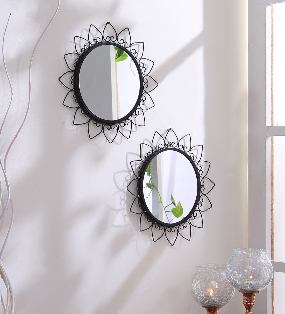 metal oval wall mirror in black colour