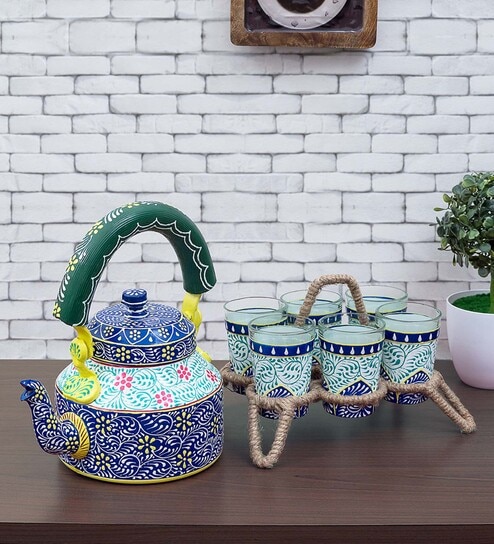 https://ii1.pepperfry.com/media/catalog/product/i/k/494x544/ikat-handpainted--set-of-8--aluminium-tea-kettle---glass-set-by-golden-peacock-ikat-handpainted--set-xzbxp9.jpg