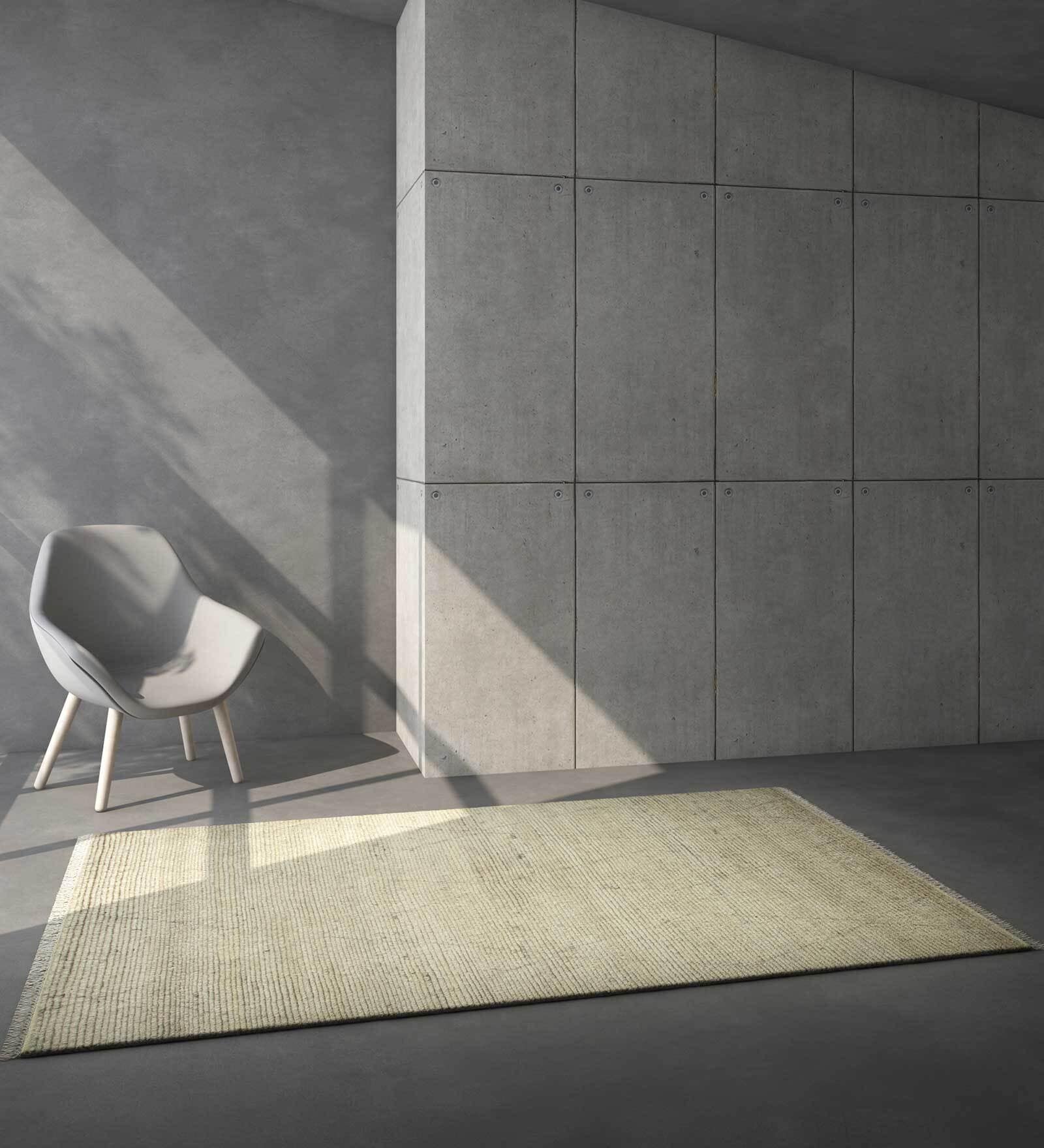 Ivory Solid Polyester 8 ft x 10 ft Hand Knotted Carpet