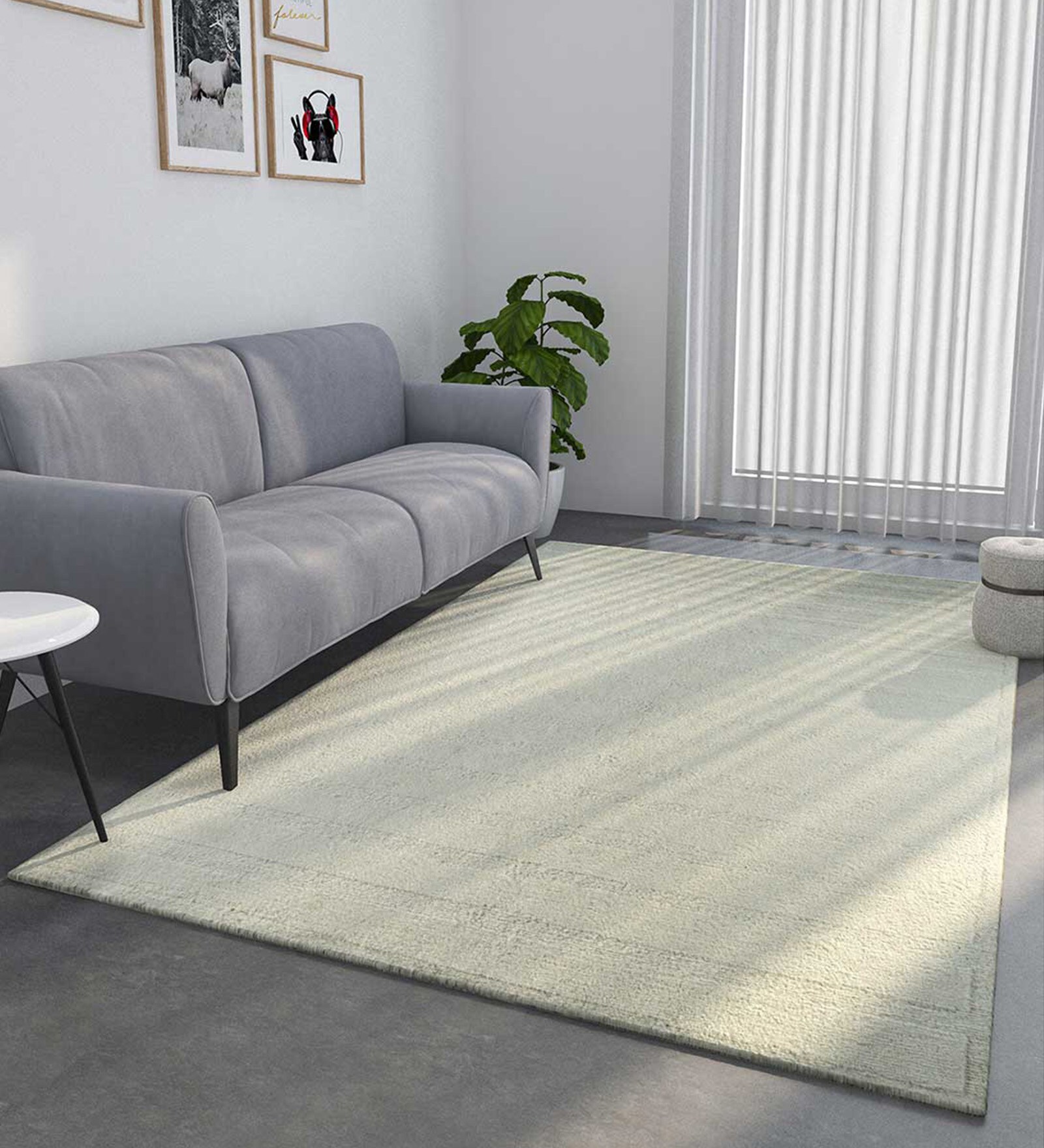 Ivory Solid Wool 6 ft x 9 ft Hand Knotted Carpet
