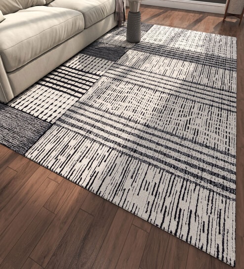 Ivory Abstract Wool 6 ft X 9 ft Hand Tufted Rectangle Carpet