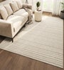 Ivory Solid Wool 6 ft X 9 ft Hand Woven Carpet