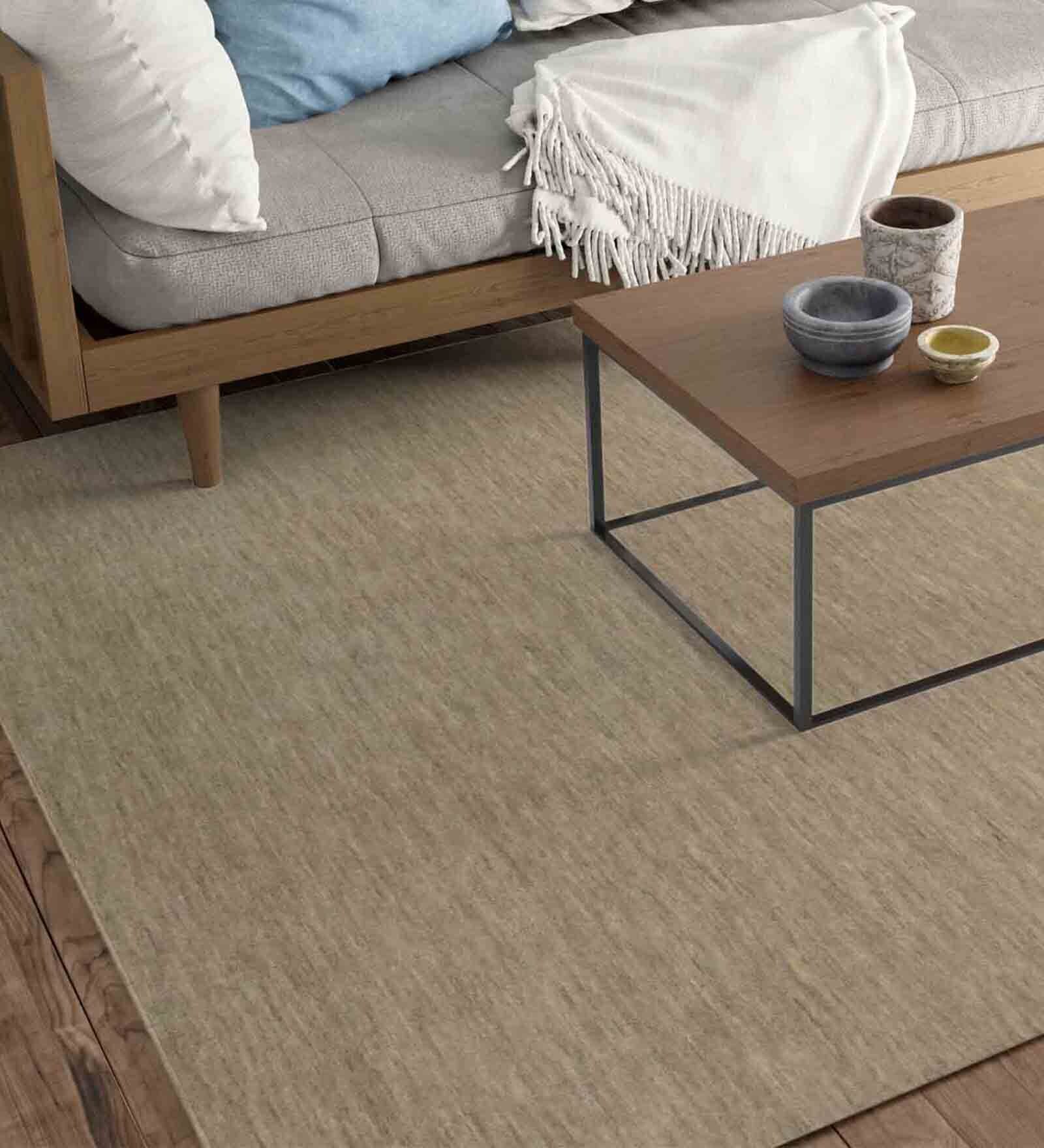 Beige Solid Wool 5 ft x 7 ft Hand Woven Carpet