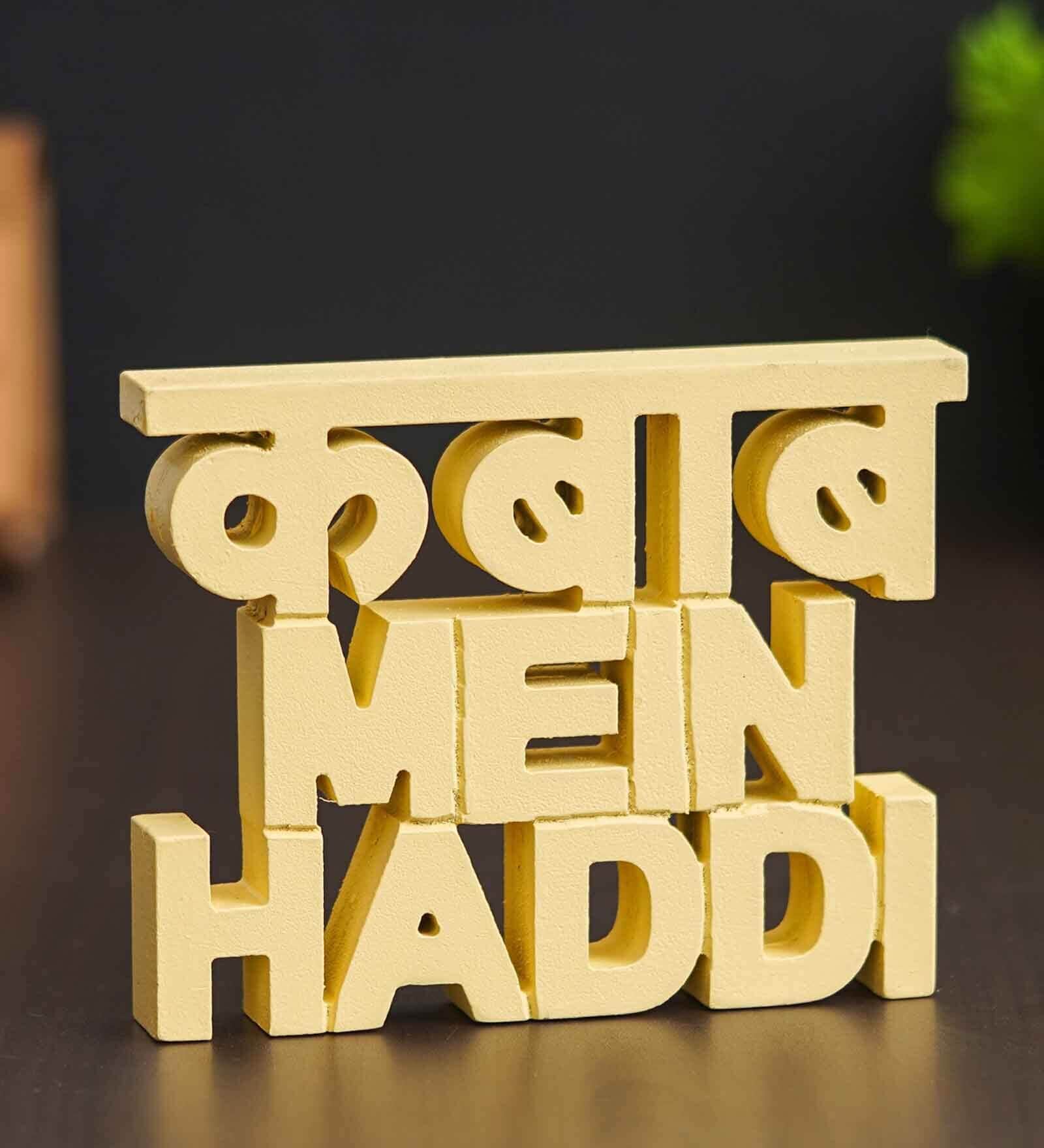 Kabab Mein Haddi Yellow Engineered Wood Showpiece