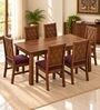 Kosha 6 Seater Dining Set In Provincial Teak Finish With Plum Colour Chair Kosha 6 Seater Dining Set In Provincial Teak Finish With Plum Colour Chair