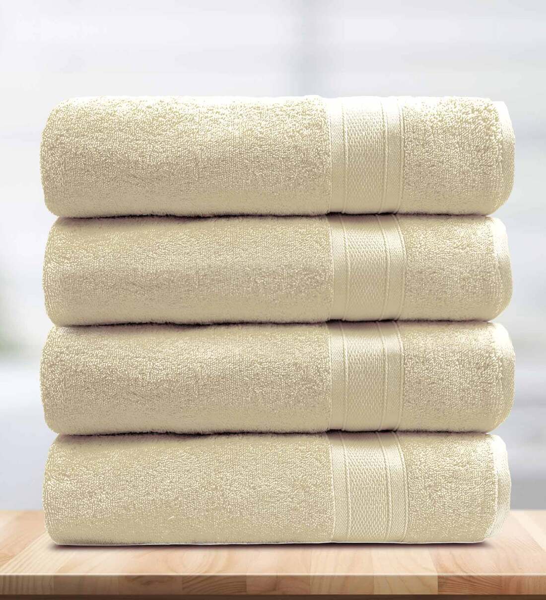 Buy Beige Solid 500 GSM Cotton Bath Towels (Set of 4) by Trident at 42