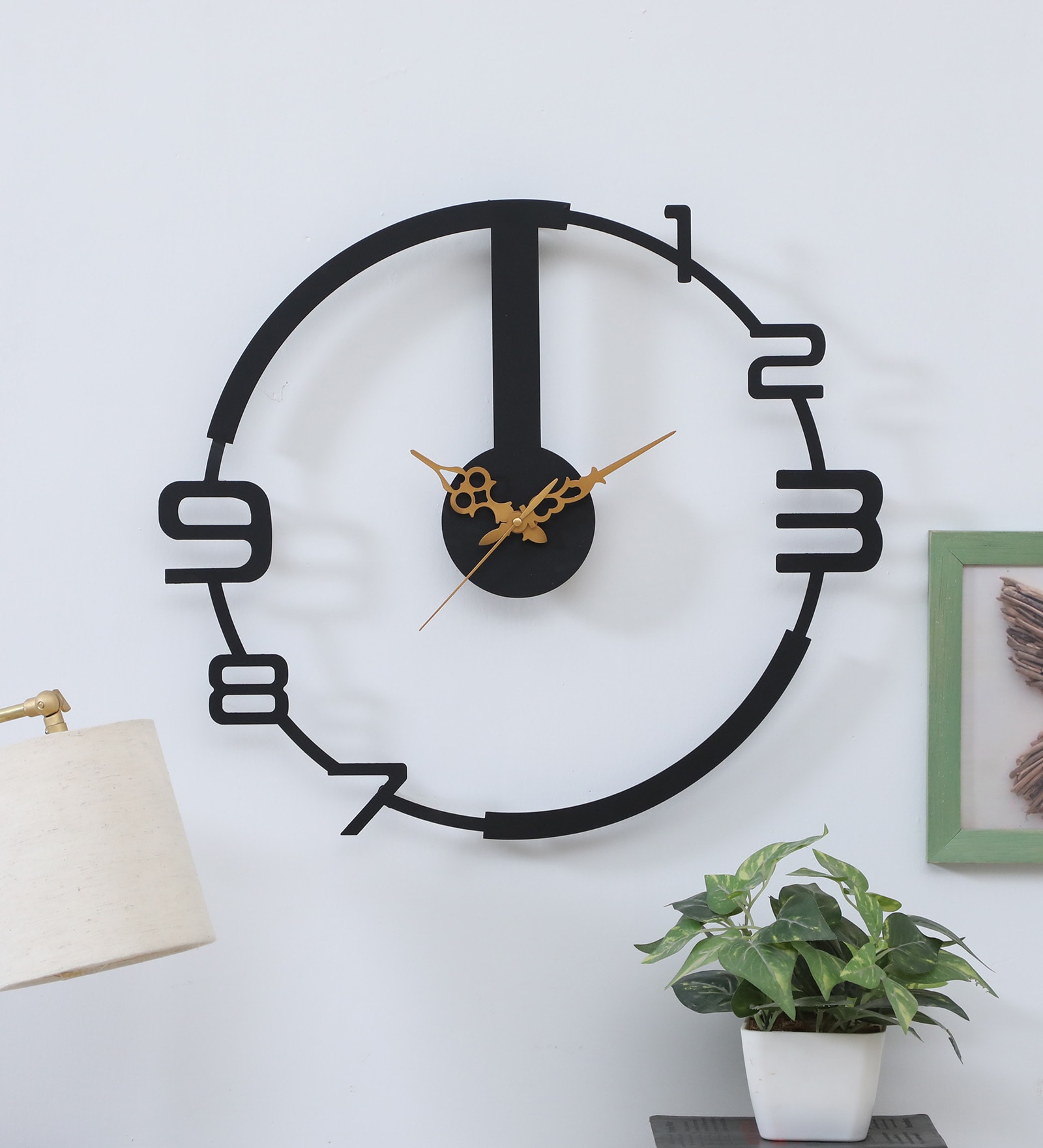 Buy Lumina Black Iron Novelty Wall Clock at 6% OFF by Mint Furnish ...