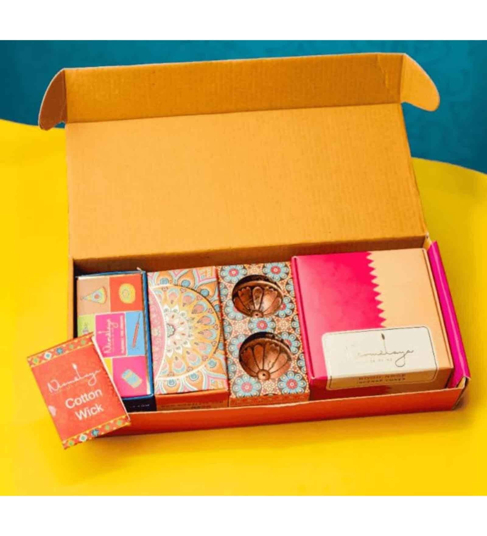 Mandala Gift Box with PLANTABLE Crackers Diwali Hamper (40 Incense Cone Box, Rangoli Box- 5 Colors & Terracotta Diyas)