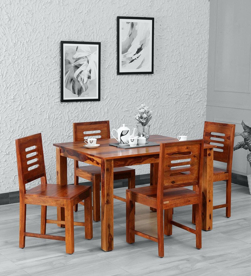 4 seater wooden dining table and chairs