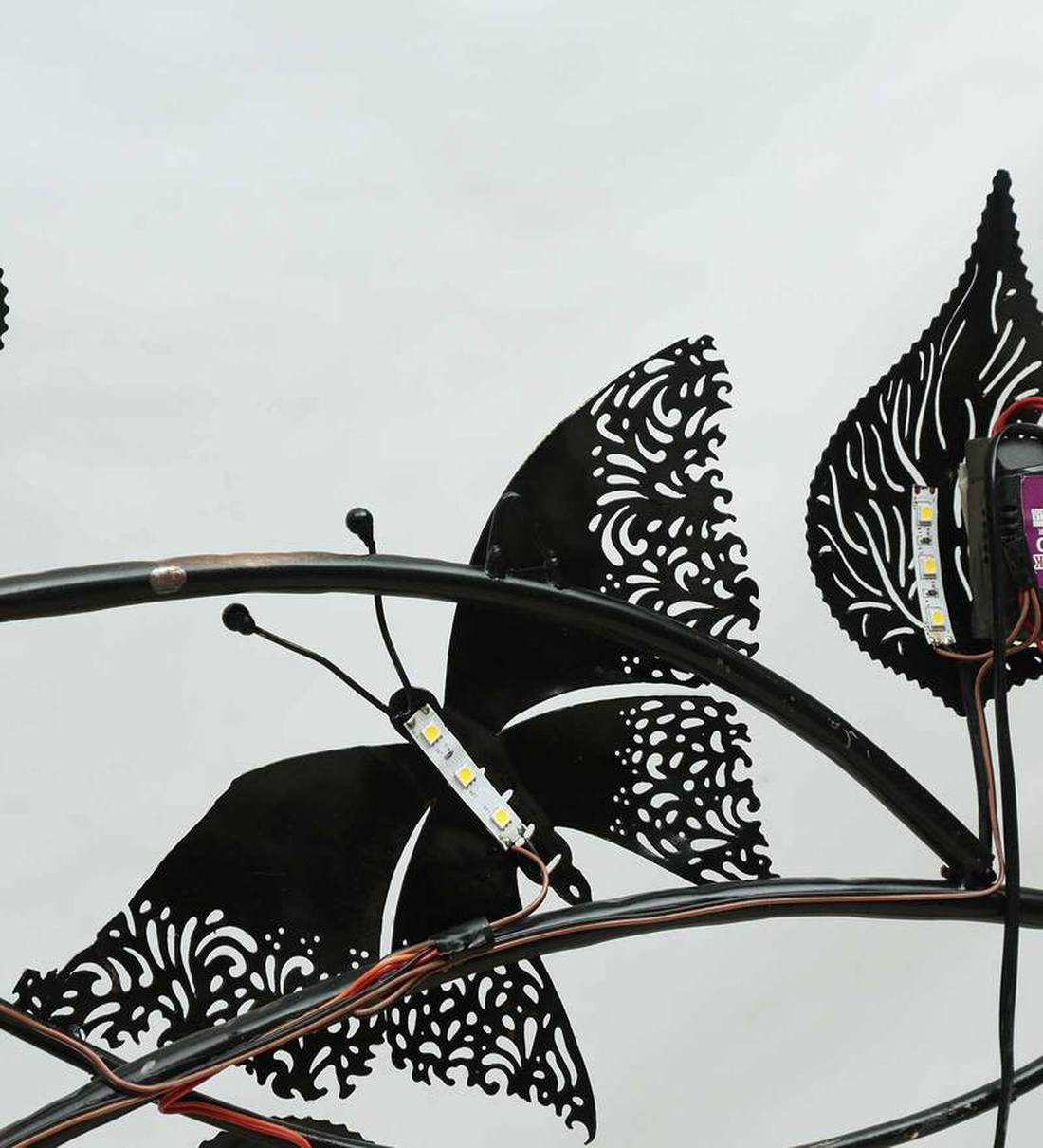 Buy Iron Butterfly On Leaf Wall Art With LED In Brown By Malik Design