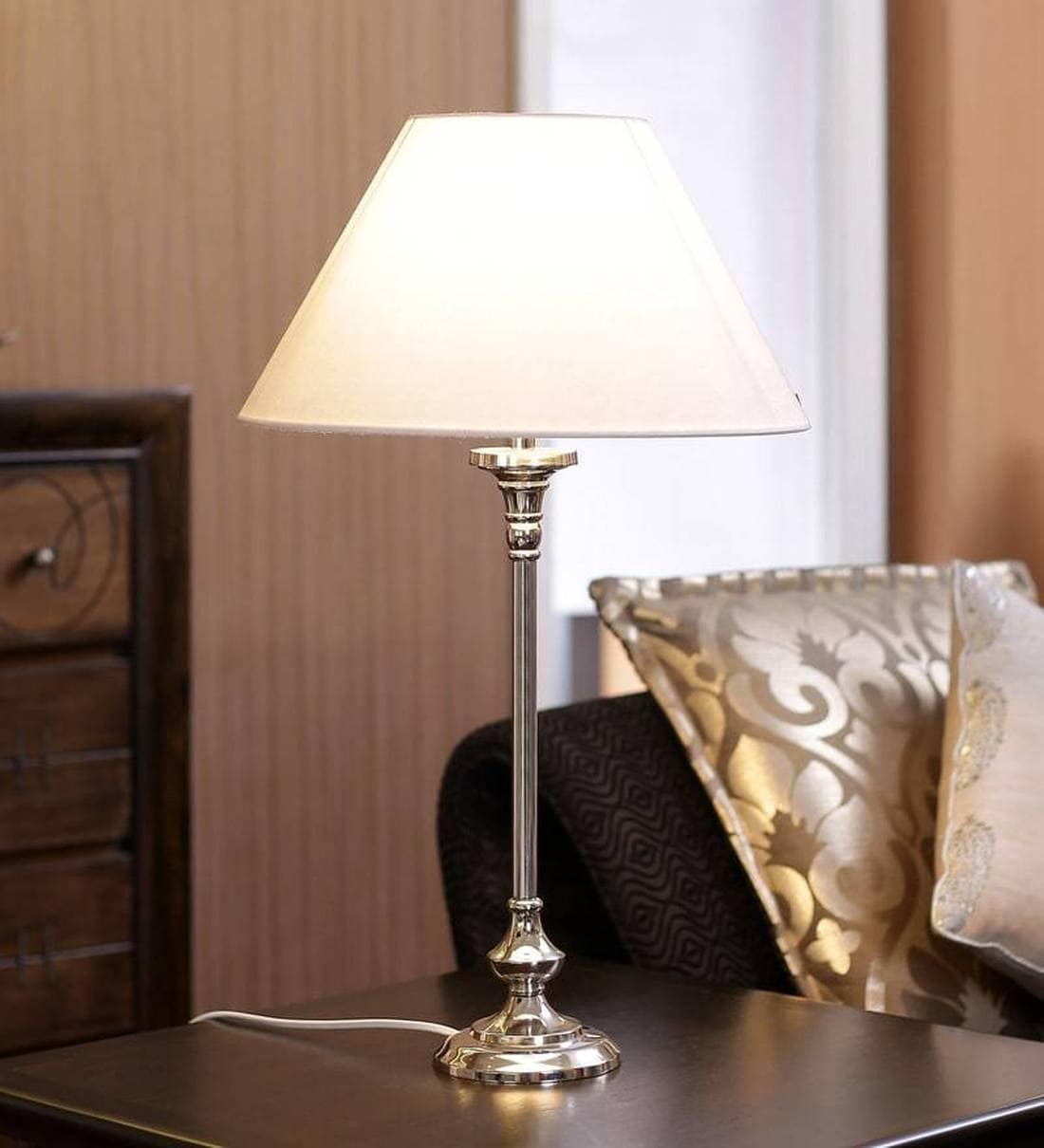 white lamp with silver base