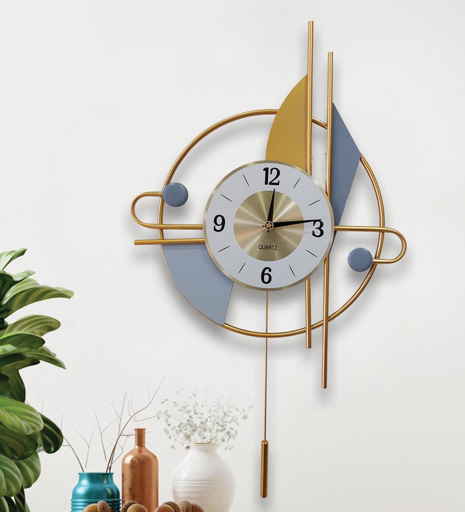 Metal Designer Wing Pendulum Wall Clock In Grey