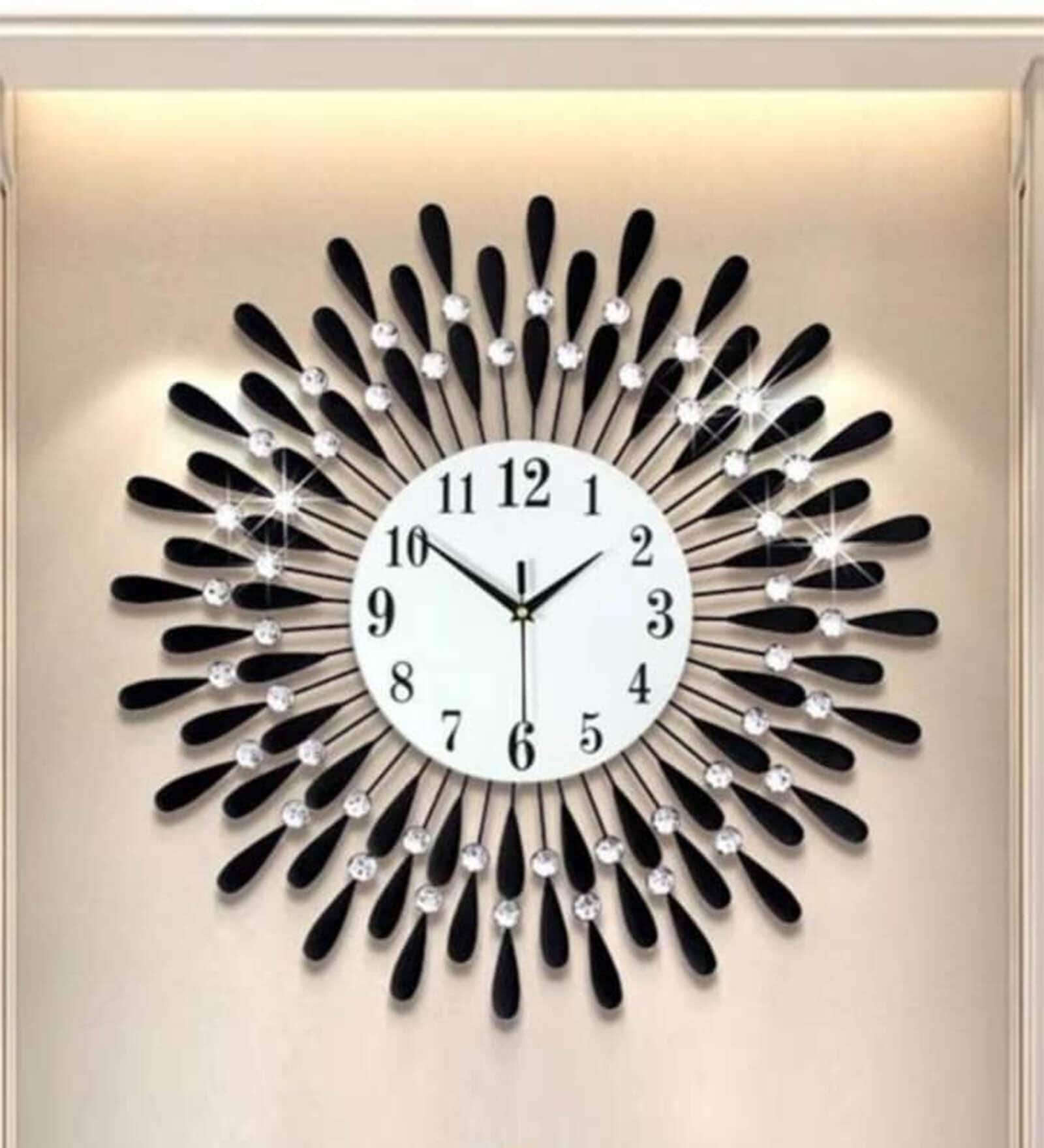 Buy Metal Surya Decorative Large Size Wall Clock In Black at 32 OFF by Indoorscape Pepperfry