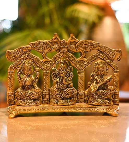 Golden Metal Laxmi Ganesh and Sarawati Idol with Dual Peacocks